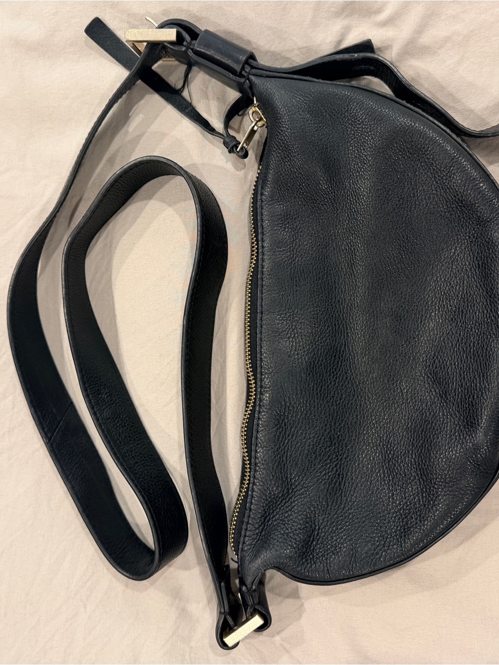 All Saints Black Leather Crescent Crossbody with Gold Hardware Trim